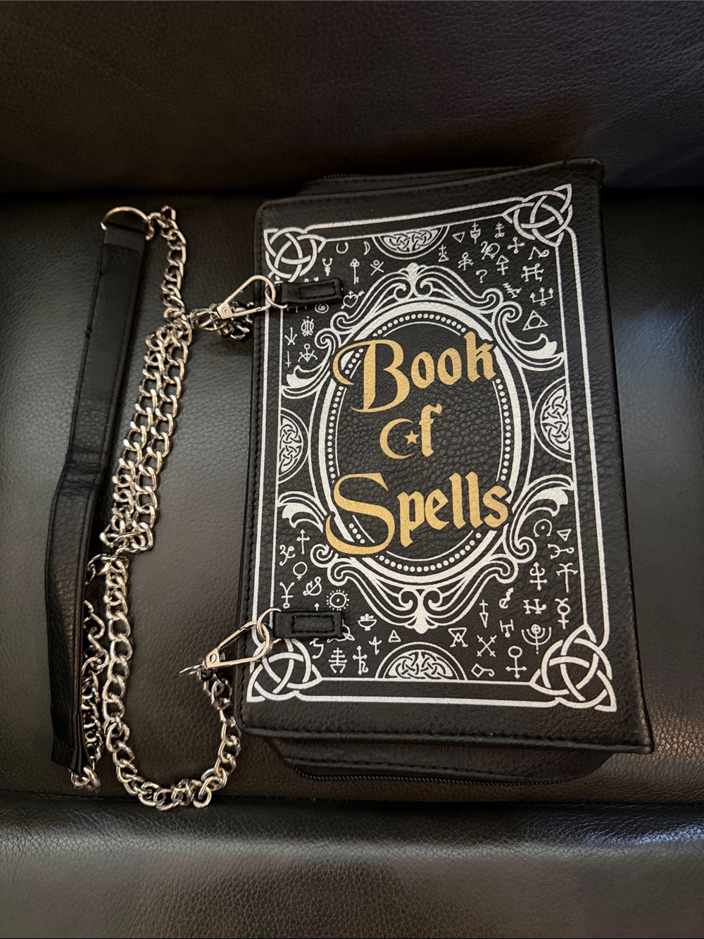Spirit 'Book of Spells' Black Crossbody Bag with Gold Lettering